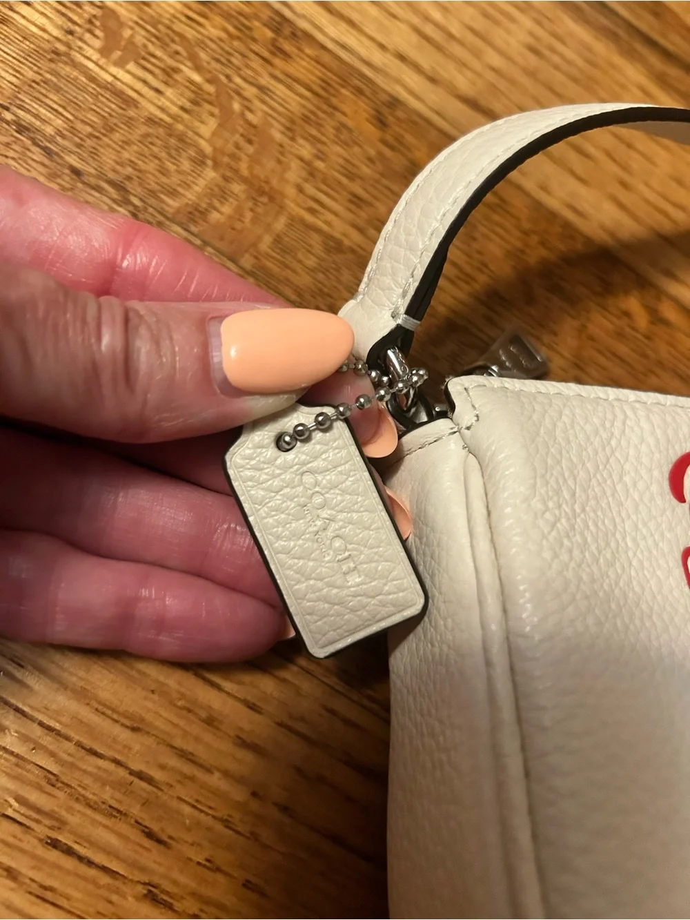 Coach charming off